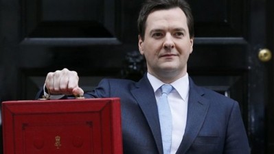 Chancellor George Osborne displaying his red, leathery box. Source Flickr/Chingster23