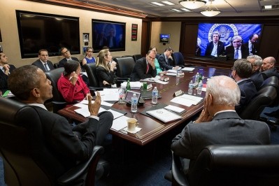 US President Barack Obama and Vice President Joe Biden hold a teleconference with Secretary of State John Kerry attending Iran negotiations in Switzerland in March. (Image: White House/Pete Souza)