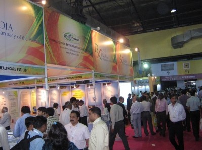 Attendees collect badges and info packs at CPhI India 